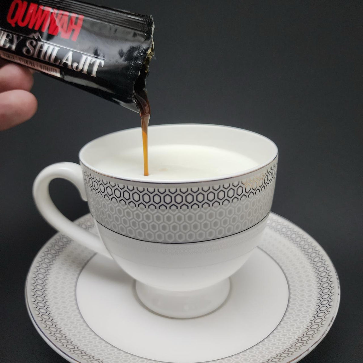 QUWWAH Honey Shilajit Salajeet sachet poured into warm milk for daily use