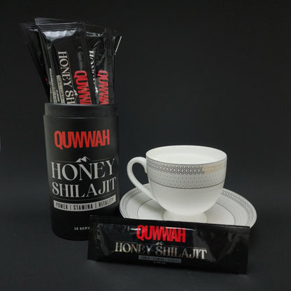 QUWWAH Honey Shilajit sticks displayed with product container and tea cup